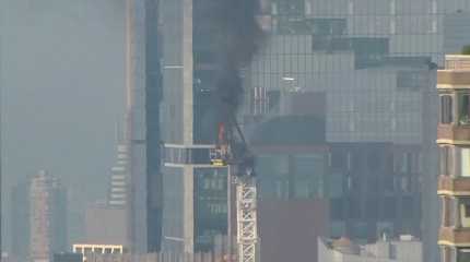 construction crane caught fire in Manhattan