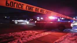 Police tape surrounds the crime scene