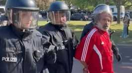 German police arresting Nakaba protester