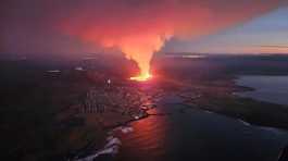 volcano spews lava erupts
